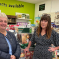 Pauline and local shopkeeper discussing the impact of the increases