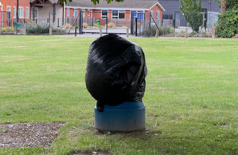 Shinfield litter bin shrouded in black plastic bag by WBC