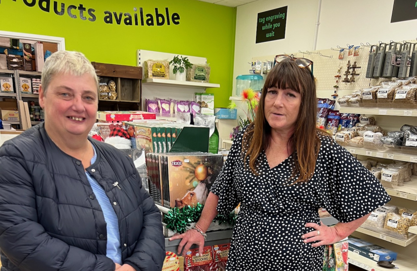 Pauline and local shopkeeper discussing the impact of the increases