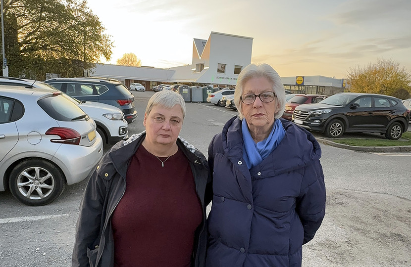 Jackie Rance and Pauline Jorgensen at a busy School Green car park.