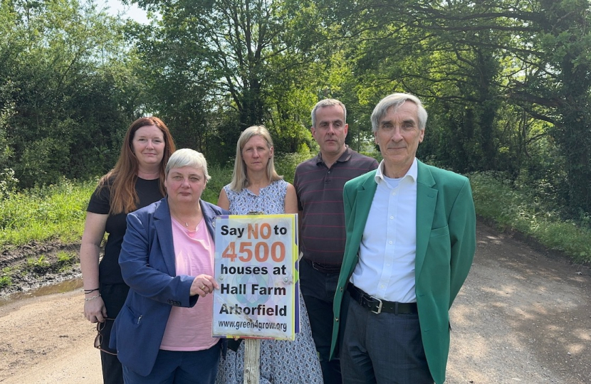 No to Hall Farm sign with Councillors and John Redwood