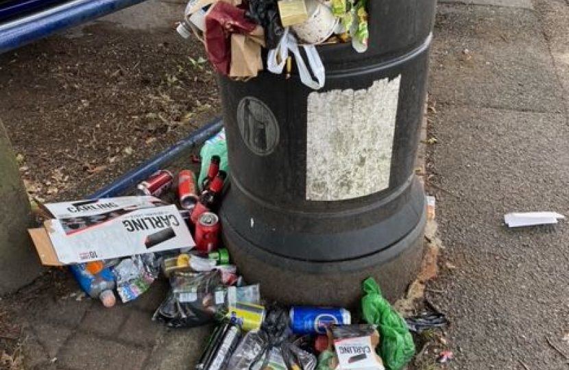 Overflowing litter bin