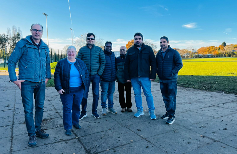 Pauline Jorgensen with some members of Woodley Cricket Club at Woodford Park