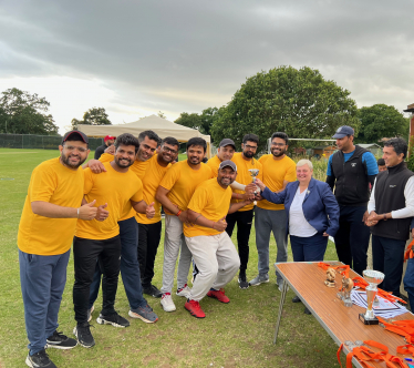 Pauline presenting cricket trophy