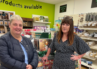 Pauline talking to Woodley shopkeepers about the impact of parking charge increases on their livelihood