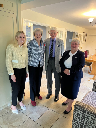 Theresa May and Pauline Jorgensen at a meeting in Sonning