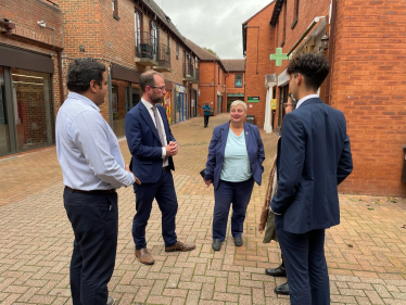 Pauline talking to the Police and Crime Commissioner and local residents in Maiden Place 