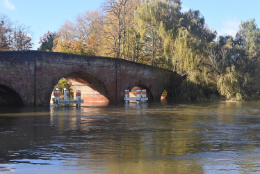 Sonning bridge with the Thames running high