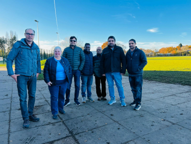 Pauline Jorgensen with some members of Woodley Cricket Club at Woodford Park